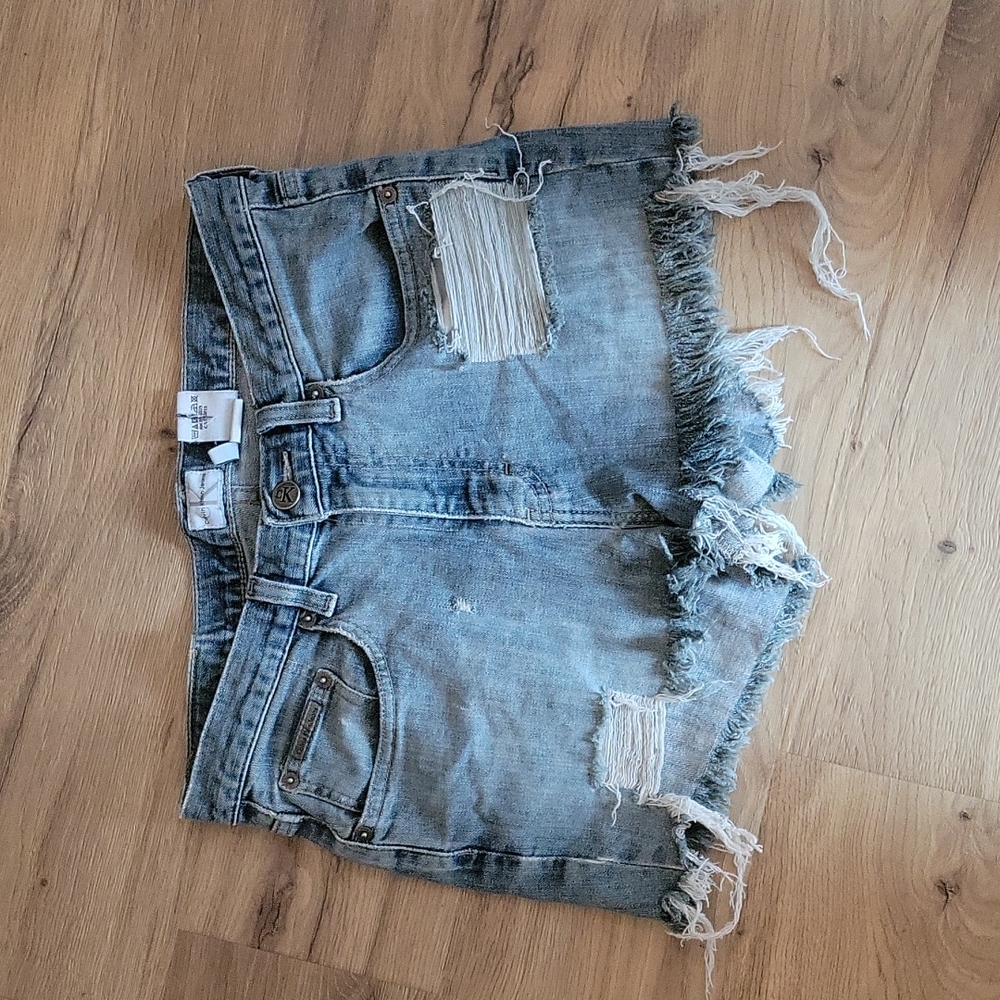 Calvin Klein distressed denim shorts Size 6